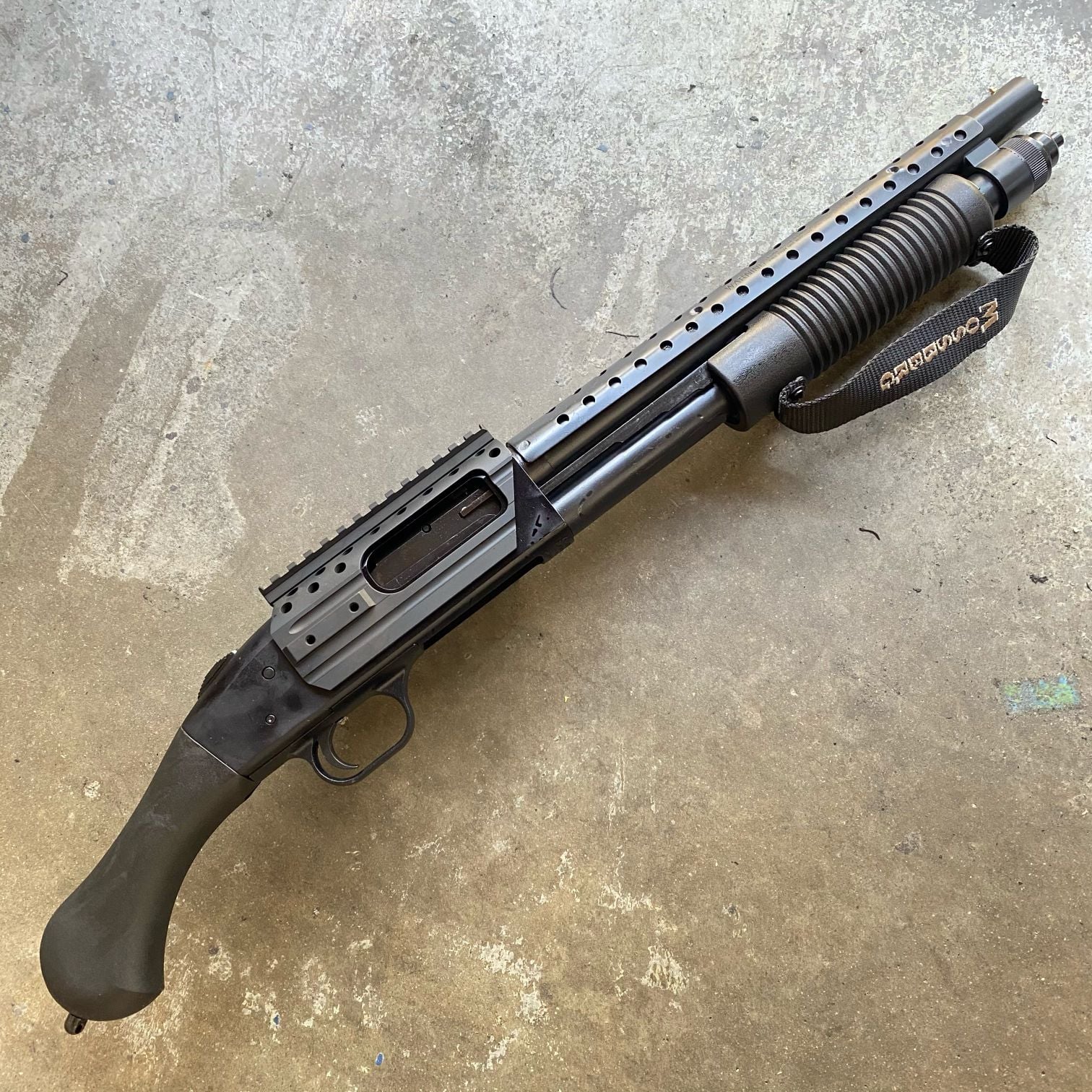 Mossberg 590 Shockwave SPX 12 Gauge 3in Black Pump Firearm -